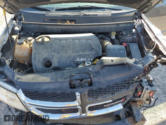 2013 Dodge Journey SXT with VIN 3C4PDCBGXDT630423, listed as a Copart auction lot 62359685 with 151,653 mi miles and Salvage title. Bid and sale history available at DreamBid. Image 12.