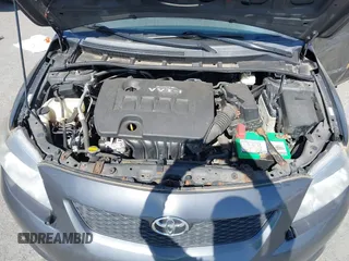 2009 Toyota Corolla with VIN 1NXBU40E99Z108425, listed as a IAAI auction lot 39553892 with 208,165 mi miles and . Bid and sale history available at DreamBid. Image 10.