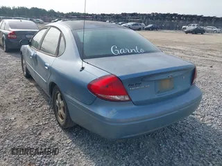 2006 Ford Taurus SE z VIN 1FAFP53U96A241825, wystawiony jako IAAI lot #42286654 z przebiegiem 205 136 mil mil oraz . Historia ofert i sprzedaży dostępna na DreamBid. Obrazek 3.