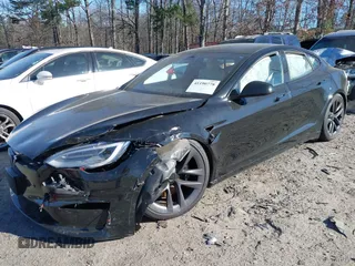 2021 Tesla Model S Long Range z VIN 5YJSA1E50MF438864, wystawiony jako IAAI lot #41190778 z przebiegiem Nie podano mil oraz . Historia ofert i sprzedaży dostępna na DreamBid. Obrazek 2.