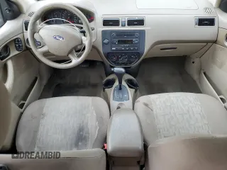 2005 Ford Focus S with VIN 1FAFP34N55W105530, listed as a Copart auction lot 59186695 with 136,204 mi miles and Salvage title. Bid and sale history available at DreamBid. Image 8.