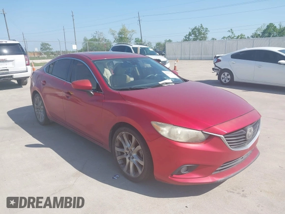 2014 Mazda 6 i Grand Touring with VIN JM1GJ1W65E1141953, listed as a IAAI auction lot 42027145 with 187,514 mi miles and . Bid and sale history available at DreamBid. Image 1.