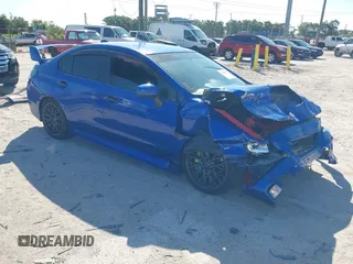 2016 Subaru WRX with VIN JF1VA1B62G9823616, listed as a IAAI auction lot 42028560 with 90,543 mi miles. Bid and sale history available at carsss.com. Image 1.