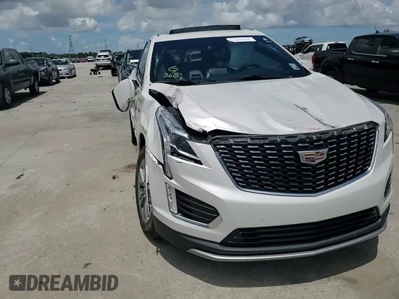 2021 Cadillac XT5 FWD Premium Luxury z VIN 1GYKNCR44MZ106982, wystawiony jako Copart lot #62234455 z przebiegiem 93 079 mil mil oraz Szkoda całkowita • Salvage title. Historia ofert i sprzedaży dostępna na DreamBid. Obrazek 14.