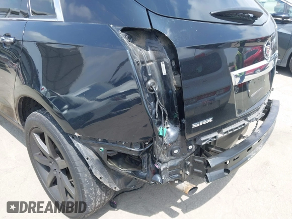 2014 Cadillac SRX Luxury Collection with VIN 3GYFNBE34ES639647, listed as a IAAI auction lot 42108140 with 99,740 mi miles and . Bid and sale history available at DreamBid. Image 19.