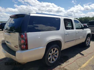 2011 GMC Yukon XL Denali with VIN 1GKS1MEF0BR314275, listed as a Copart auction lot 63796214 with 176,438 mi miles and Salvage Title. Bid and sale history available at carsss.com. Image 3.