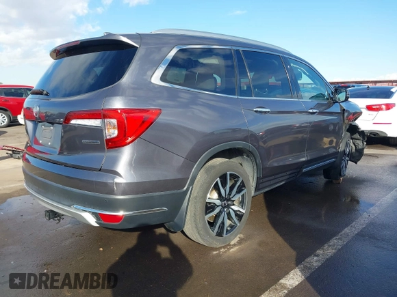 2019 Honda Pilot Touring 7-Passenger z VIN 5FNYF5H65KB020420, wystawiony jako IAAI lot #41575972 z przebiegiem 48 950 mil mil oraz . Historia ofert i sprzedaży dostępna na DreamBid. Obrazek 4.