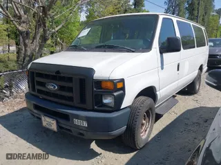 2009 Ford Econoline Wagon XL with VIN 1FBSS31L79DA40051, listed as a IAAI auction lot 41991120 with 170,373 mi miles. Bid and sale history available at carsss.com. Image 2.