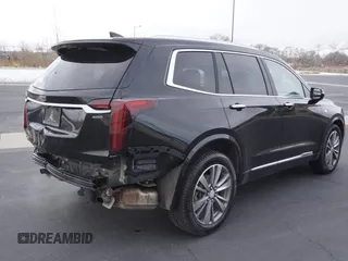 2021 Cadillac XT6 Premium Luxury z VIN 1GYKPDRS3MZ113033, wystawiony jako Copart lot #50076845 z przebiegiem 104 248 mil mil oraz Szkody całkowita. Historia ofert i sprzedaży dostępna na DreamBid. Obrazek 3.