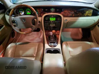 2006 Jaguar XJ with VIN SAJWA71B26SG50496, listed as a Copart auction lot 84859414 with 179,314 mi miles and Clean Title. Bid and sale history available at carsss.com. Image 8.