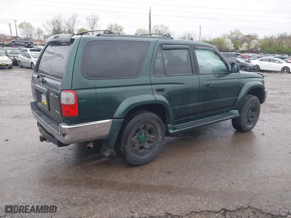 2000 Toyota 4Runner SR5 with VIN JT3HN86R9Y0294975, listed as a IAAI auction lot 41985007 with 218,761 mi miles. Bid and sale history available at carsss.com. Image 4.