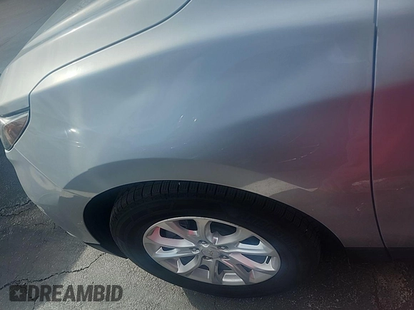 2020 Chevrolet Equinox LT z VIN 2GNAXJEV0L6231512, wystawiony jako IAAI lot #42516878 z przebiegiem 67 453 mil mil oraz . Historia ofert i sprzedaży dostępna na DreamBid. Obrazek 26.