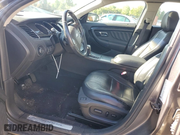 2011 Ford Taurus Limited z VIN 1FAHP2FW3BG146981, wystawiony jako Copart lot #58124275 z przebiegiem 64 163 mil mil oraz Szkoda całkowita • Salvage title. Historia ofert i sprzedaży dostępna na DreamBid. Obrazek 7.