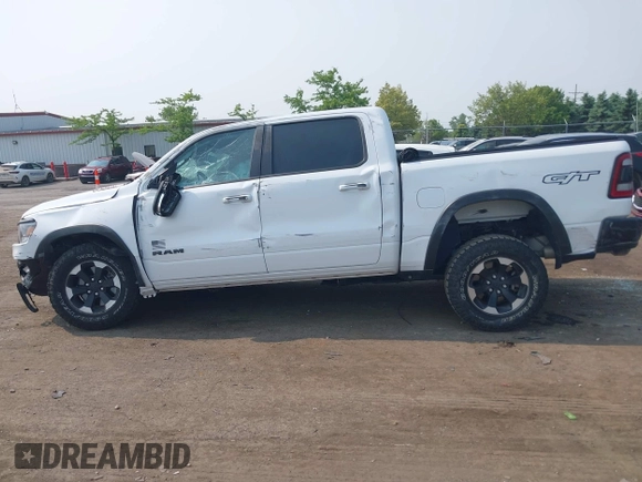 2022 Ram 1500 Rebel with VIN 1C6SRFLT5NN318494, listed as a IAAI auction lot 42413194 with 59,458 mi miles and . Bid and sale history available at DreamBid. Image 14.