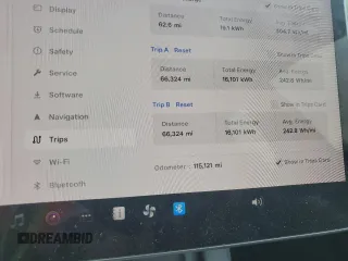 2023 Tesla Model 3 with VIN 5YJ3E1EA6PF437390, listed as a Copart auction lot 62825135 with 115,121 mi miles and Clean title. Bid and sale history available at DreamBid. Image 9.