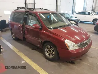 2011 Kia Sedona LX with VIN KNDMG4C78B6411157, listed as a IAAI auction lot 40671496 with 153,768 mi miles. Bid and sale history available at carsss.com. Image 1.