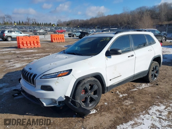 2015 Jeep Cherokee North with VIN 1C4PJMCS7FW792850, listed as a IAAI auction lot 41323432 with 102,642 mi miles. Bid and sale history available at carsss.com. Image 17.