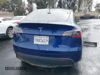 2022 Tesla Model Y Long Range with VIN 7SAYGDEE7NF409294, listed as a IAAI auction lot 41845261 with 73,116 mi miles and . Bid and sale history available at DreamBid. Image 16.