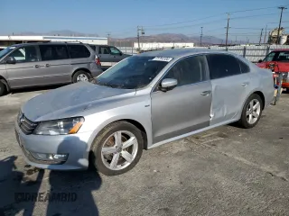 2015 Volkswagen Passat 1.8T Limited Edition with VIN 1VWAT7A30FC121838, listed as a Copart auction lot 73764104 with 76,918 mi miles and Clean Title. Bid and sale history available at carsss.com. Image 1.