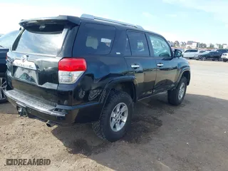 2010 Toyota 4Runner SR5 with VIN JTEZU5JR5A5010223, listed as a IAAI auction lot 41758066 with 221,166 mi miles. Bid and sale history available at carsss.com. Image 4.