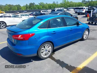 2015 Ford Focus Titanium with VIN 1FADP3J24FL322247, listed as a IAAI auction lot 41998030 with 151,341 mi miles and . Bid and sale history available at carsss.com. Image 4.