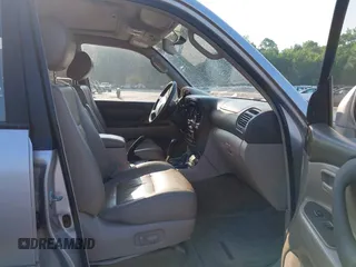 2001 Toyota Land Cruiser z VIN JTEHT05J912007249, wystawiony jako IAAI lot #42409963 z przebiegiem 303 292 mil mil oraz . Historia ofert i sprzedaży dostępna na DreamBid. Obrazek 5.