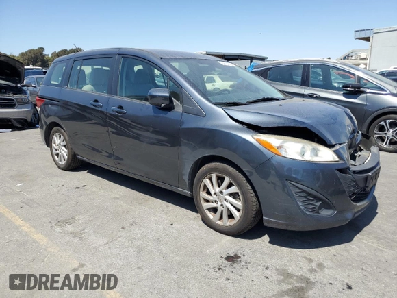 2012 Mazda 5 Sport with VIN JM1CW2BL0C0103969, listed as a Copart auction lot 64404424 with 133,398 mi miles and Salvage Title. Bid and sale history available at DreamBid. Image 4.