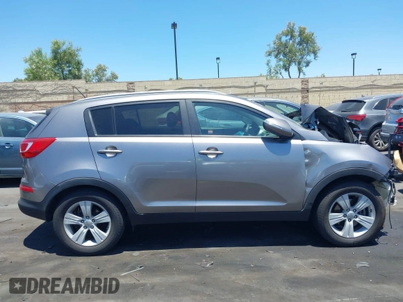 2012 Kia Sportage LX with VIN KNDPB3A2XC7273890, listed as a IAAI auction lot 39784243 with 146,067 mi miles. Bid and sale history available at carsss.com. Image 14.