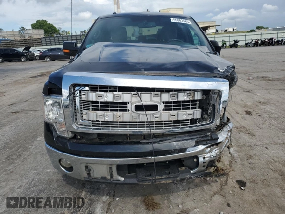 2014 Ford F-150 XL with VIN 1FTFW1CF6EFC07818, listed as a Copart auction lot 56003585 with 153,562 mi miles and Salvage title. Bid and sale history available at DreamBid. Image 5.