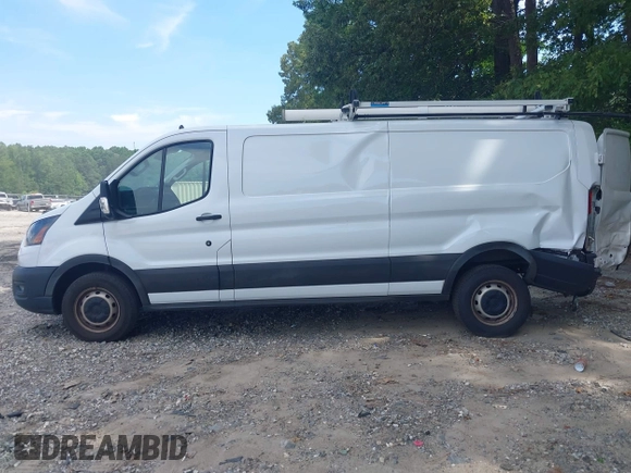 2023 Ford Transit Cargo z VIN 1FTYE1Y82PKA83403, wystawiony jako IAAI lot #42621450 z przebiegiem 44 617 mil mil oraz . Historia ofert i sprzedaży dostępna na DreamBid. Obrazek 14.