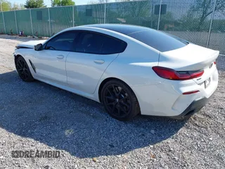 2022 BMW 8 Series M850i with VIN WBAGV8C09NCH15245, listed as a IAAI auction lot 42053154 with 26,384 mi miles and . Bid and sale history available at DreamBid. Image 3.