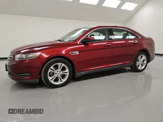 2015 Ford Taurus SEL z VIN 1FAHP2E88FG167415, wystawiony jako Copart lot #55577955 z przebiegiem 119 504 mil mil oraz Tytuł czysty. Historia ofert i sprzedaży dostępna na DreamBid. Obrazek 1.