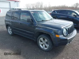 2014 Jeep Patriot Latitude with VIN 1C4NJRFB1ED846282, listed as a IAAI auction lot 41912886 with 107,657 mi miles. Bid and sale history available at carsss.com. Image 1.