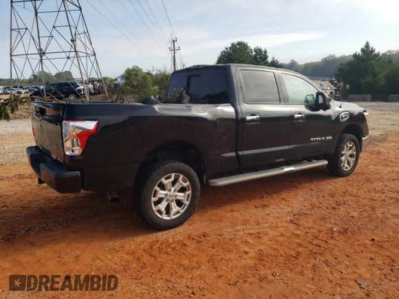 2016 Nissan Titan XD PRO-4X with VIN 1N6BA1F45GN506648, listed as a Copart auction lot 74381534 with 154,114 mi miles and Salvage Title. Bid and sale history available at carsss.com. Image 3.