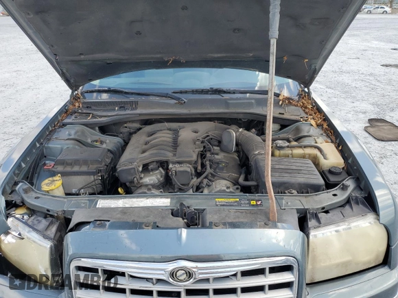 2005 Chrysler 300 Touring z VIN 2C3JA53G95H546536, wystawiony jako Copart lot #60667575 z przebiegiem 163 625 mil mil oraz Szkoda całkowita • Salvage title. Historia ofert i sprzedaży dostępna na DreamBid. Obrazek 11.