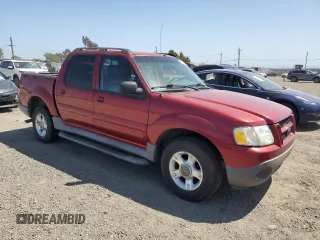 2003 Ford Explorer Sport Trac XLS with VIN 1FMZU67E23UA00848, listed as a Copart auction lot 55514955 with 101,070 mi miles and Salvage title. Bid and sale history available at DreamBid. Image 4.