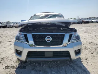 2019 Nissan Armada SL z VIN JN8AY2ND4K9087456, wystawiony jako Copart lot #53859545 z przebiegiem Nie podano mil oraz Szkoda całkowita • Salvage title. Historia ofert i sprzedaży dostępna na DreamBid. Obrazek 5.