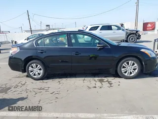 2012 Nissan Altima 2.5 S with VIN 1N4AL2AP4CN533534, listed as a IAAI auction lot 41890287 with 97,097 mi miles. Bid and sale history available at carsss.com. Image 14.