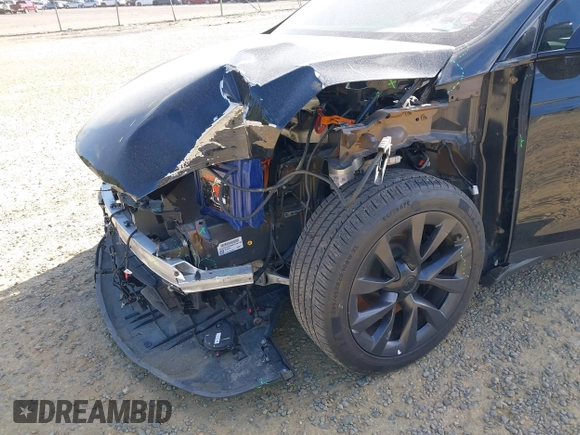 2022 Tesla Model X with VIN 7SAXCAE59NF346186, listed as a IAAI auction lot 41893923 with Not Provided miles and . Bid and sale history available at DreamBid. Image 6.