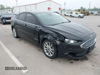 2017 Ford Fusion Hybrid SE with VIN 3FA6P0LU6HR301233, listed as a IAAI auction lot 42451022 with 115,312 mi miles and . Bid and sale history available at DreamBid. Image 1.