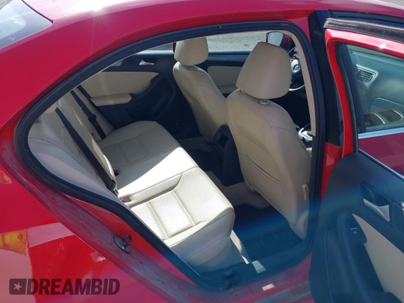 2014 Volkswagen Jetta TDI w/Premium with VIN 3VWLL7AJ8EM372627, listed as a IAAI auction lot 42418054 with 119,926 mi miles and . Bid and sale history available at DreamBid. Image 8.