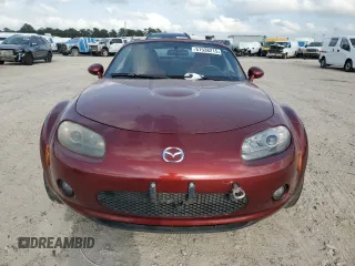 2007 Mazda MX-5 Miata Sport z VIN JM1NC25F270127574, wystawiony jako Copart lot #51538215 z przebiegiem 131 339 mil mil oraz Szkoda całkowita • Salvage title. Historia ofert i sprzedaży dostępna na DreamBid. Obrazek 5.