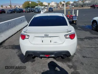 2015 Scion FR-S with VIN JF1ZNAA12F9709707, listed as a IAAI auction lot 41545940 with 107,575 mi miles. Bid and sale history available at carsss.com. Image 16.