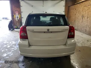 2011 Dodge Caliber Heat z VIN 1B3CB5HA6BD222153, wystawiony jako Copart lot #56881205 z przebiegiem 153 950 mil mil oraz Szkody całkowita. Historia ofert i sprzedaży dostępna na DreamBid. Obrazek 6.