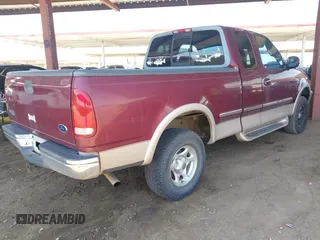 1998 Ford F-150 with VIN 1FTZX18WXWNC06973, listed as a IAAI auction lot 42442733 with 196,754 mi miles and . Bid and sale history available at DreamBid. Image 4.