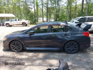 2015 Subaru WRX Premium z VIN JF1VA1D61F9828611, wystawiony jako IAAI lot #42414713 z przebiegiem 134 698 mil mil oraz . Historia ofert i sprzedaży dostępna na DreamBid. Obrazek 14.
