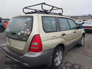2003 Subaru Forester XS with VIN JF1SG65663H753306, listed as a IAAI auction lot 41311689 with 253,269 mi miles. Bid and sale history available at carsss.com. Image 4.