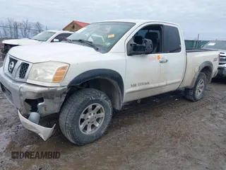 2005 Nissan Titan SE with VIN 1N6AA06BX5N512401, listed as a IAAI auction lot 41462412 with 247,849 mi miles and . Bid and sale history available at DreamBid. Image 2.