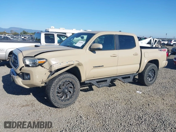 2018 Toyota Tacoma SR z VIN 3TMCZ5AN7JM125425, wystawiony jako IAAI lot #40459066 z przebiegiem 85 182 mil mil oraz . Historia ofert i sprzedaży dostępna na DreamBid. Obrazek 17.