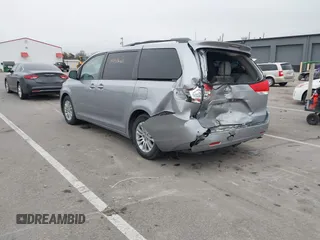 2011 Toyota Sienna XLE AAS with VIN 5TDYK3DC5BS150527, listed as a IAAI auction lot 41143189 with 147,551 mi miles and . Bid and sale history available at DreamBid. Image 3.